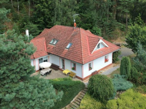 Comfortable detached house with large garden and open views